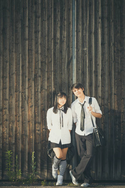 istock asian teenager with school uniforms 1005553388