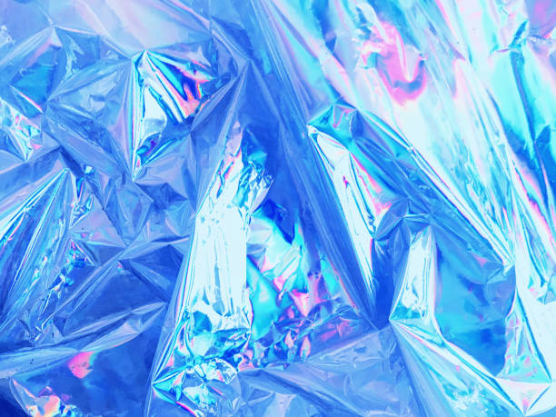 istock Holographic iridescent surface of wrinkled foil 1005560696