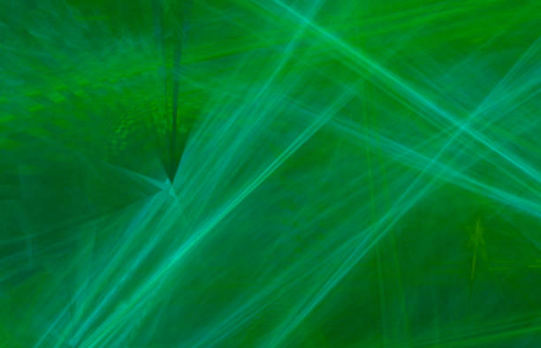 istock Green blue abstract background with lines and curves. 1005569892