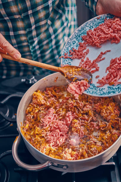 istock Preparing Homemade Spaghetti Bolognese 1005604392