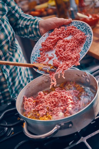 istock Preparing Homemade Spaghetti Bolognese 1005604530