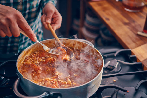 istock Preparing Homemade Spaghetti Bolognese 1005607474