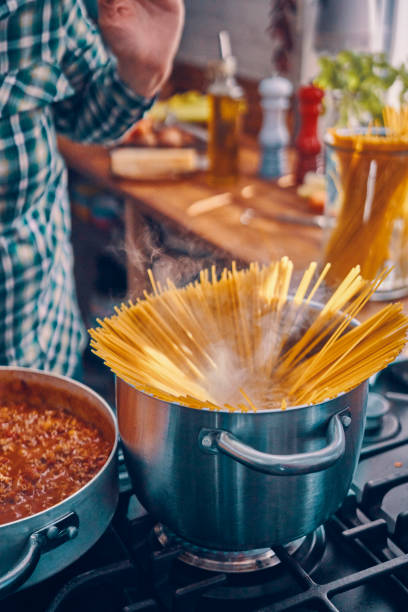 istock Preparing Homemade Spaghetti Bolognese 1005607518