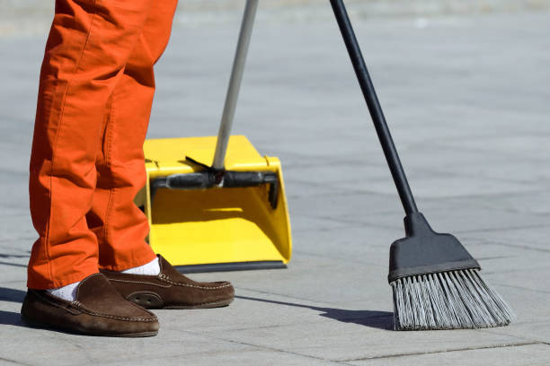 istock the janitor sweeping the tiles in the city 1005613166