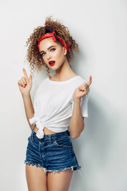 istock Young woman wearing jeans shorts 1005619098