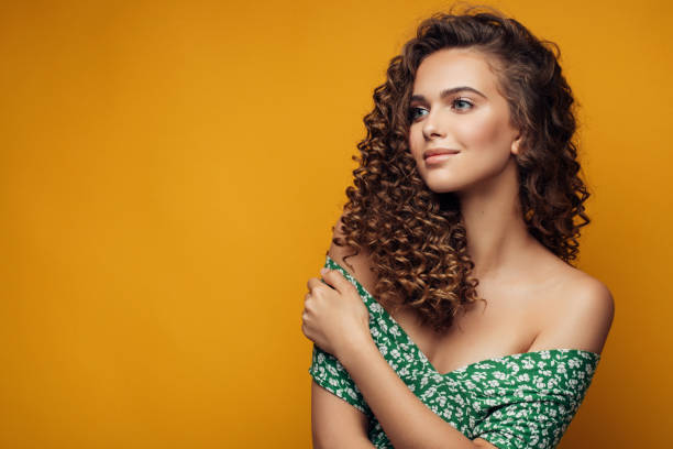 istock Elegant young woman 1005621836