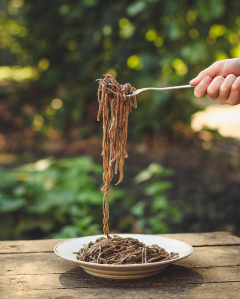 istock soba - buckwheat noodles (ready-made dish buckwheat noodles). food background 1005622164