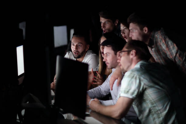 istock successful business team in the workplace at night 1005633876