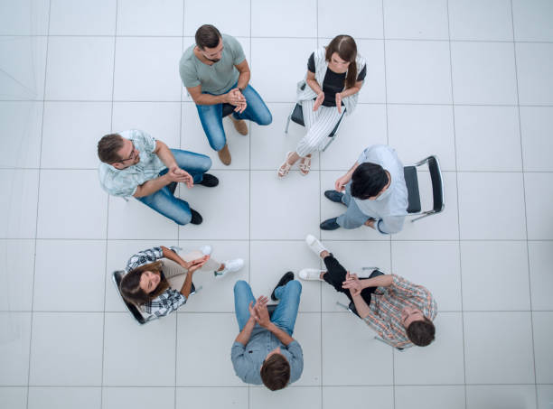 istock top view.business team discussing interesting ideas 1005637126