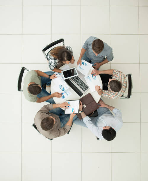 istock top view.business team making a financial report 1005641638