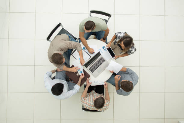 istock top view.business team making a financial report 1005641708