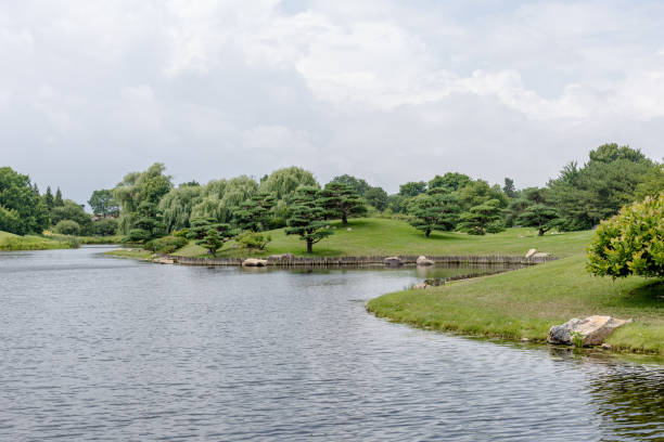 istock Green trees and grass with alcove 1005652106