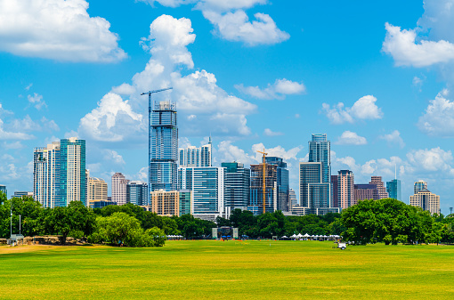 Austin Texas USA Skyline Cityscape view from Zilker Park new tower almost completed construction with crane building a new Austin Skyline 2018