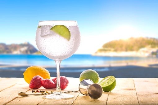 gin tonic on the beach