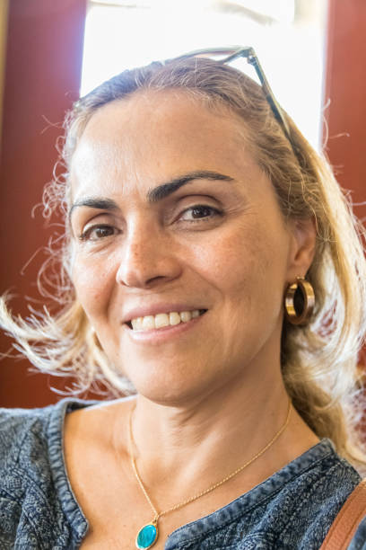 istock Smiling hispanic woman looking at the camera 1005708140