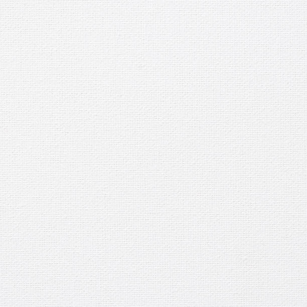 istock White canvas burlap natural fabric pattern background for arts painting 1005715528