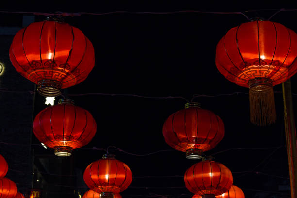 istock Red Chinese Paper Lanterns against 1005718704