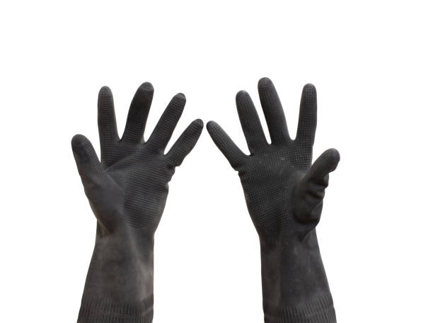 istock Man hand with black rubber glove. isolated on white background 1005728434