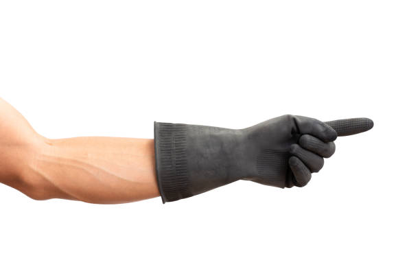 istock Man hand pointing with black rubber glove. isolated on white background; clipping path 1005728454