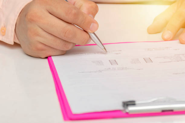 istock business man signing contract. 1005743722