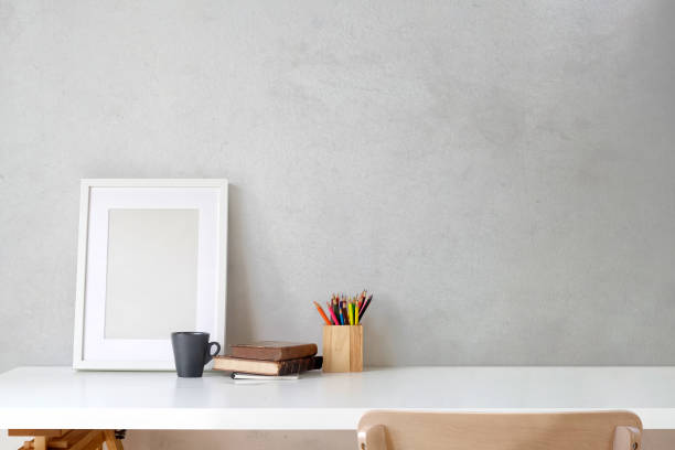 istock Poster with vintage books on table. workspace and copy space. 1005760762