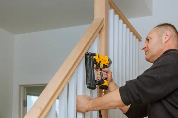 How to Install a nailing the railing for stairs with an air gun