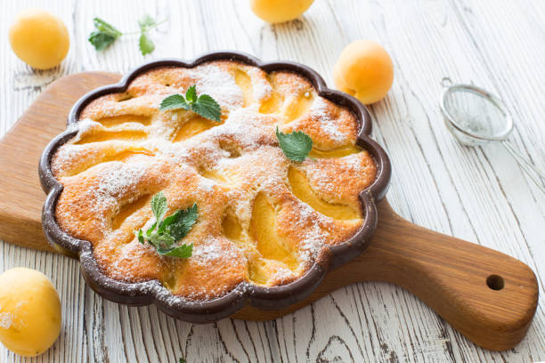 istock Apricot homemade cake and fresh apricots 1005774112