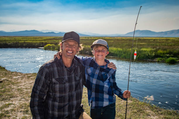 istock Father and Son Fishing 1005778748