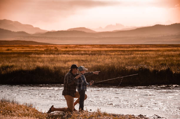 istock Father and Son Fishing 1005778760