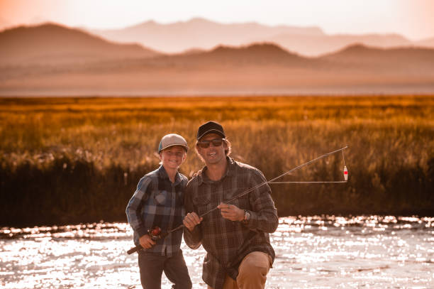 istock Father and Son Fishing 1005778778