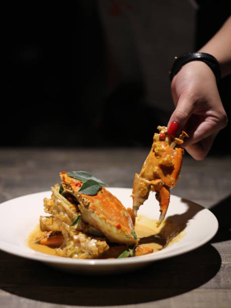 istock Singapore Chili Crab on Black Background 1005790890