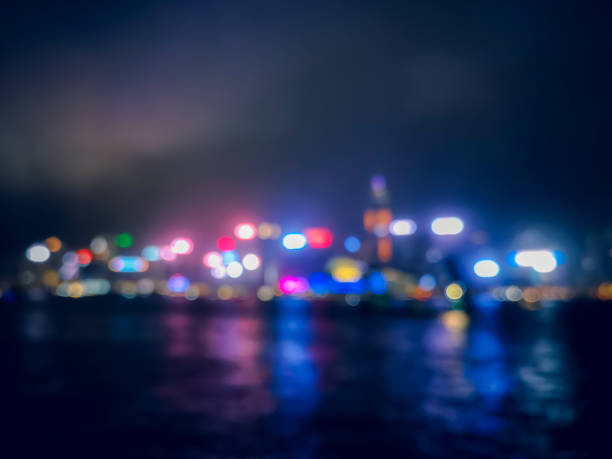 istock Blur image of Hong Kong night view with circle bokeh 1005793466