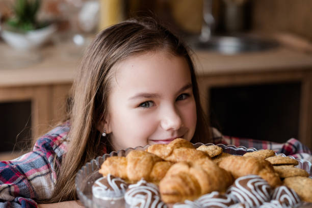 istock child sugar addiction croissant chocolate eating 1005793524