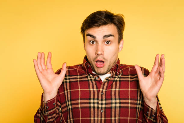 istock omg shock amazement man open mouth emotion 1005793782