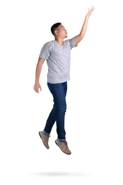 istock Levitation. Young Man Walking Jumping on Air 1005798398