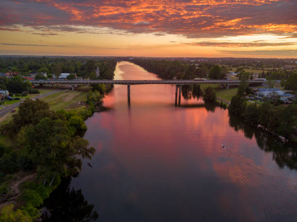 istock Sunrise and reflections across the Nepean River, Penrith 1005803100