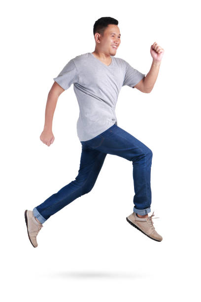 istock Levitation. Young Asian man jumping dancing walking 1005806196