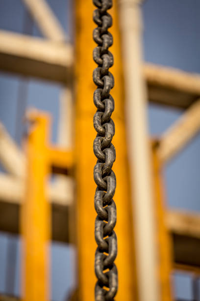 Close up of rusty old chain on concrete background