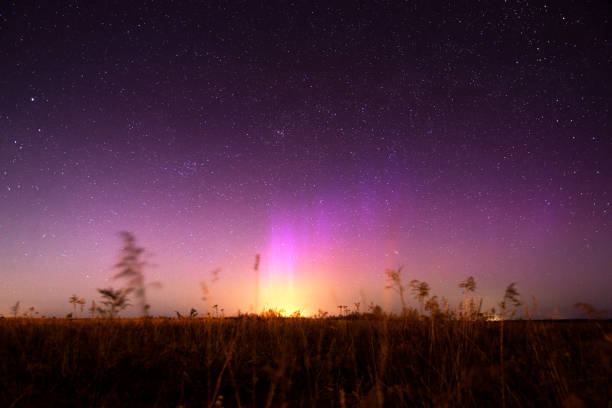 Night landscape with northern lights. Aurora borealis.