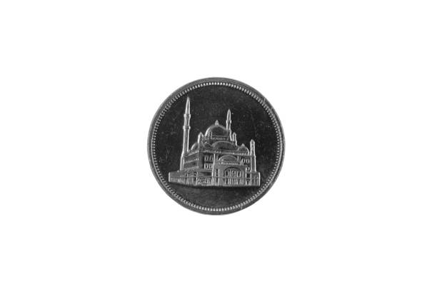 istock Egyptian Ten Piastre Coin Isolated On A white Background 1005821116