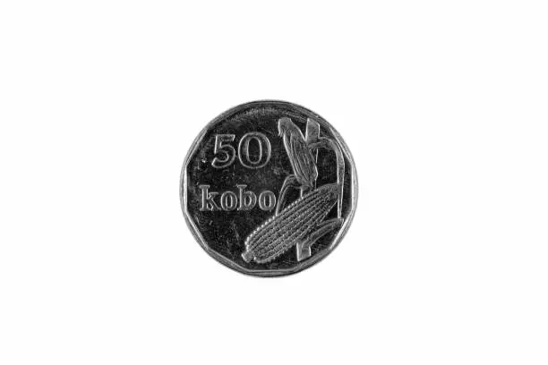 A close up image of a Nigerian 50 Kobo coin isolated on a white background