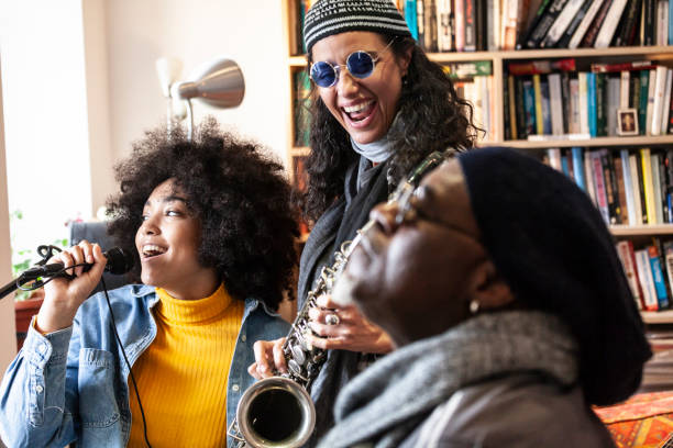 istock Group of musicians making rehearsal in studio 1005846300