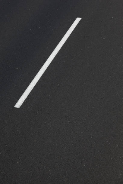istock Asphalt road with white mark line. 1005846356