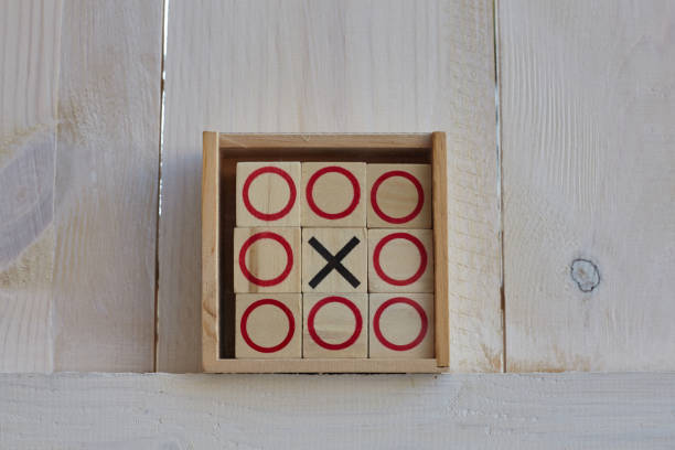 Tic tac toe game with letters, isolated on white background.