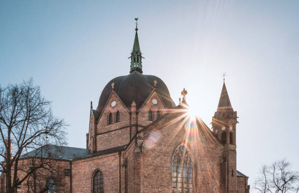 Sunshine on Trinity historic red brick church in Oslo, Norway