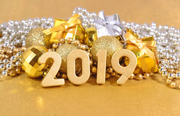 istock 2019 year golden figures and Christmas decorations 1005856624
