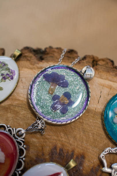 istock pendant with dry  flower inside resin 1005857056
