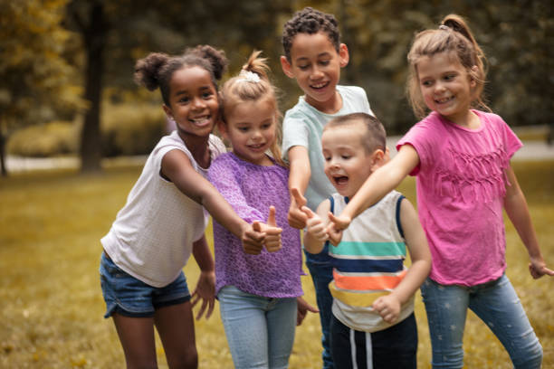 istock Group of little school friends. 1005860546