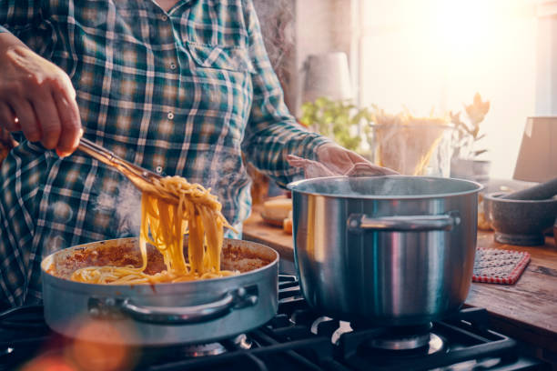 istock Preparing Homemade Spaghetti Bolognese 1005860606