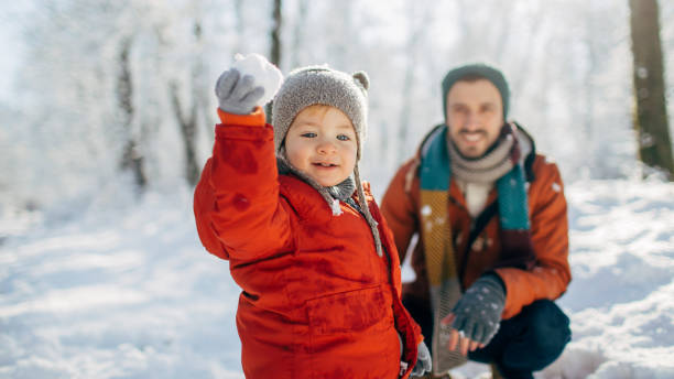 istock Snowball fight with dad 1005863468